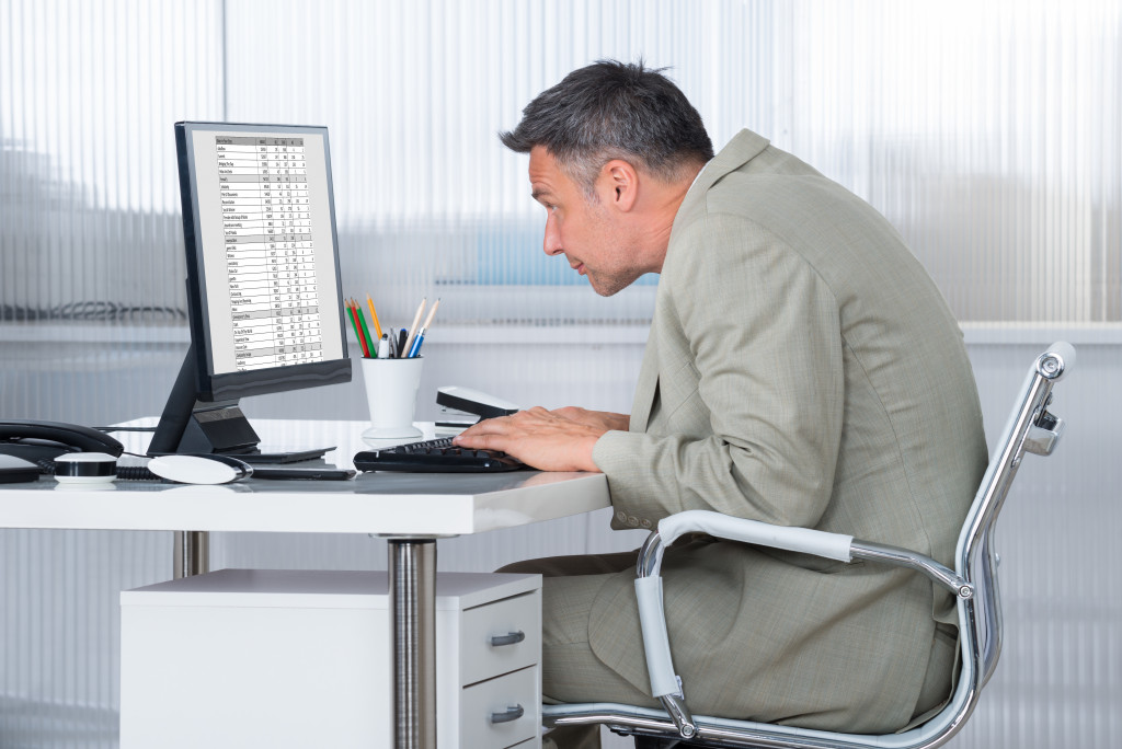 office worker with poor posture