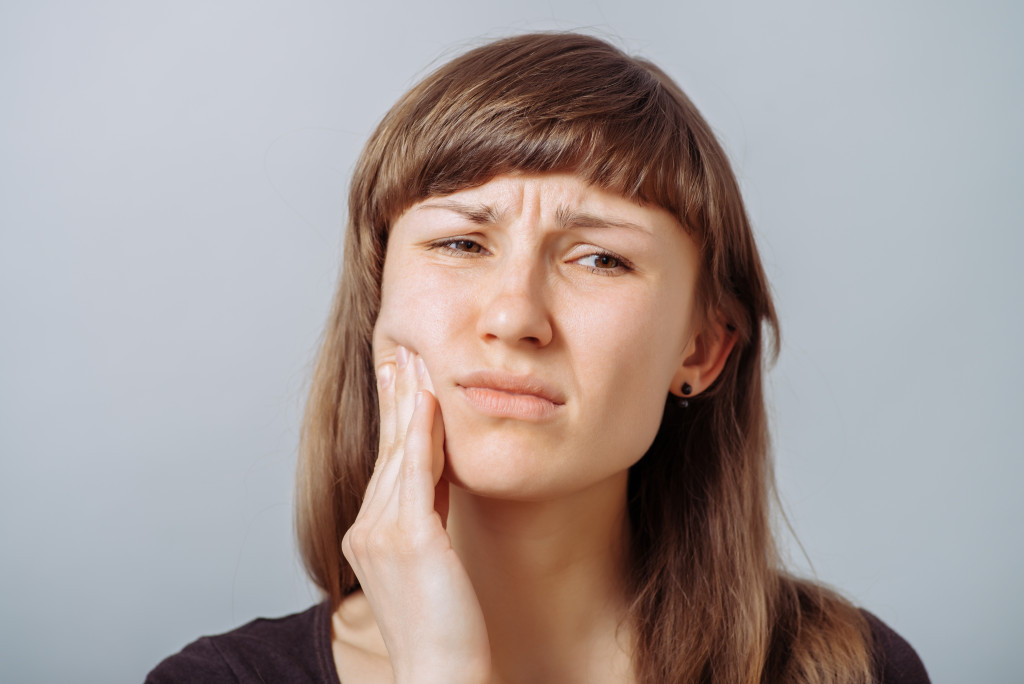 woman suffering from toothache