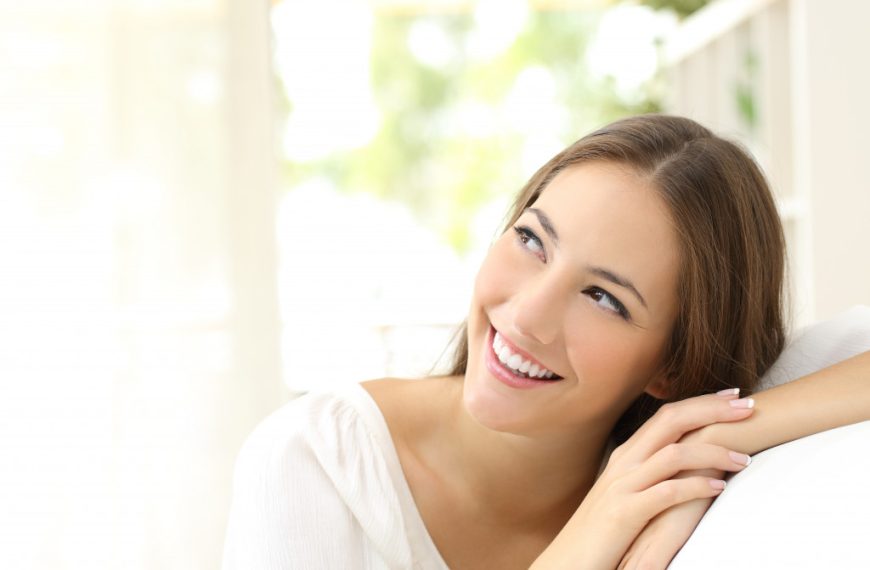 woman smiling in confidence in daylight