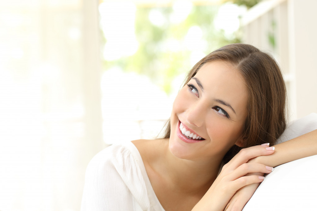 woman smiling in confidence in daylight